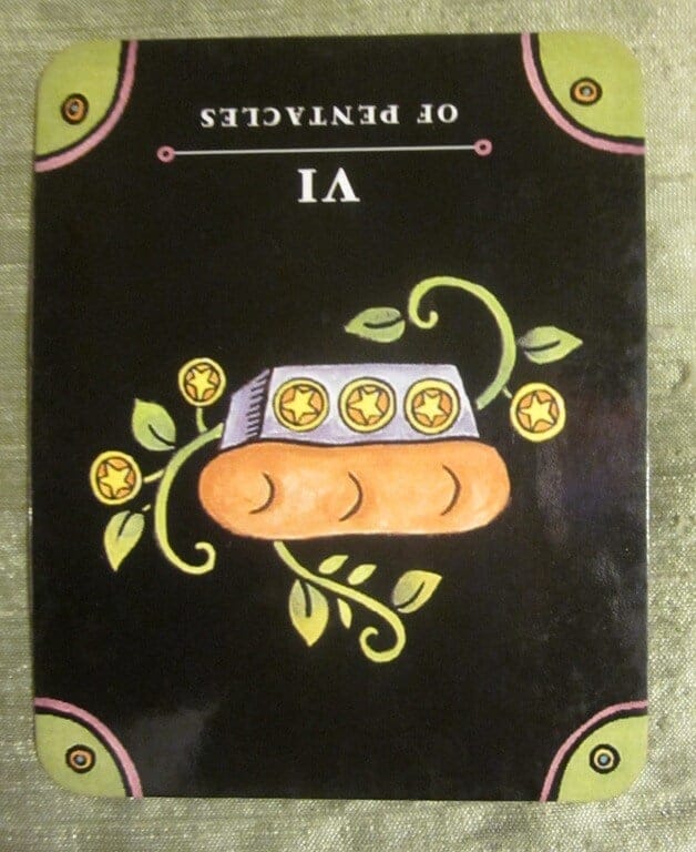 12/31/11: Giving with Strings | Six of Pentacles Rev
