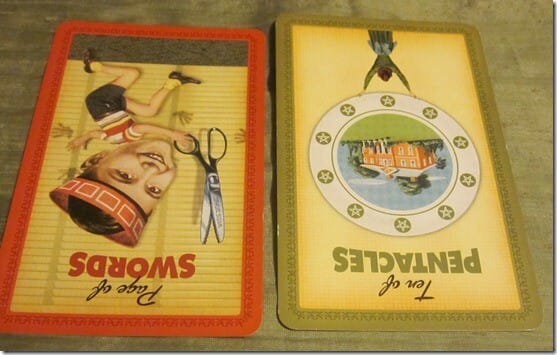 03/08/12: Power of Words | Rev Page Swords, Rev 10 Pentacles Everyday Tarot