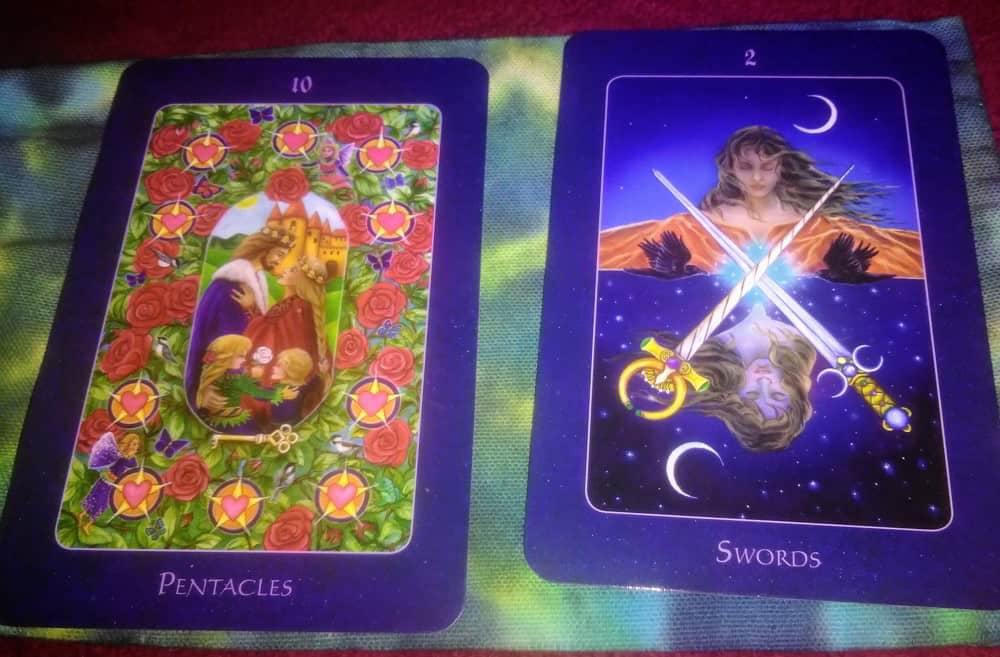 ten of pentacles two of swords tarot