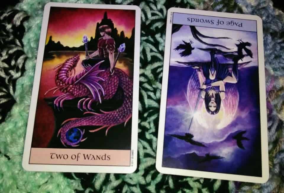 Two of Wands Reversed Page of Swords
