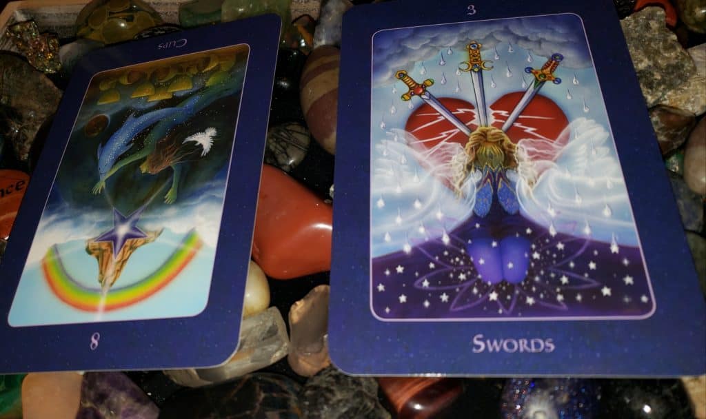 Eight of Cups rx, 3 of Swords