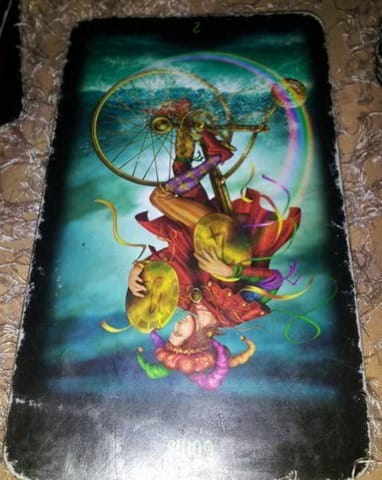 rev-2-pentacles-meaning